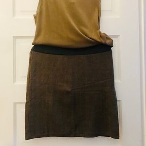 Outfit includes mini skirt with versatile cardigan
